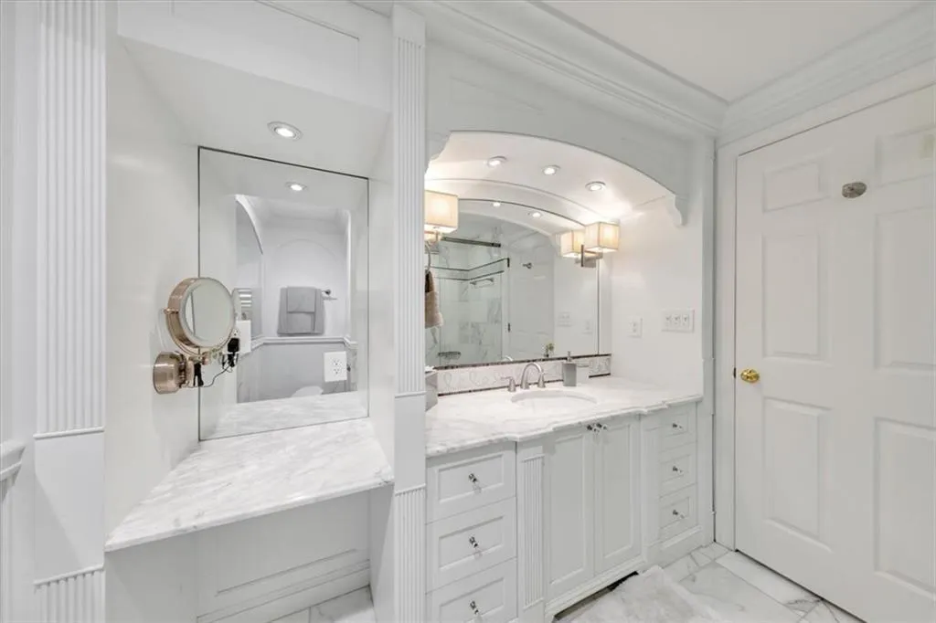 Separate double vanity areas in the guest bathroom