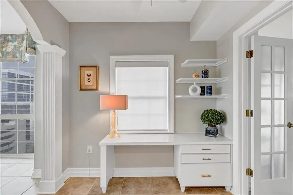 Dedicated office space with window and built-in desk