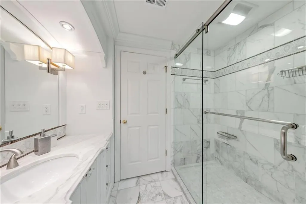 Elegant guest bathroom with newly converted shower, new plumbing, faucets and toilet