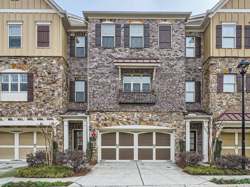 Townhome / multi-family property with a garage