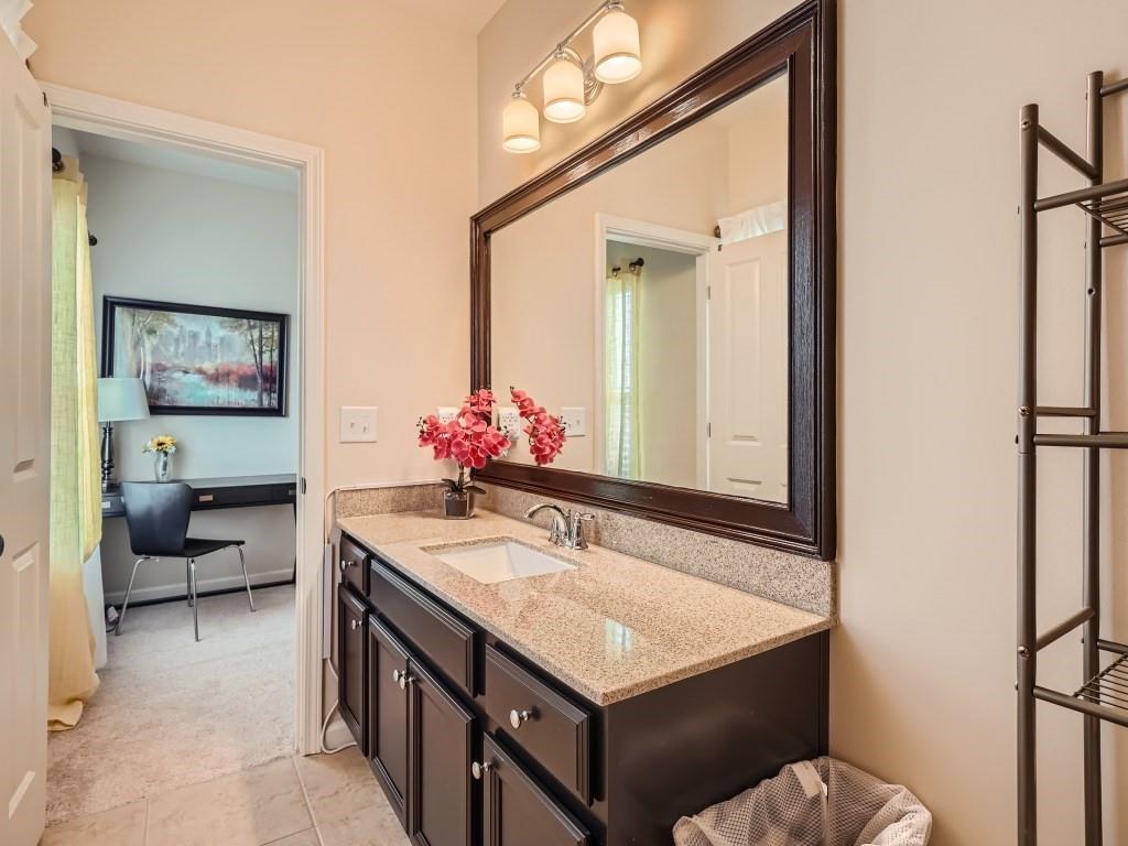 Bathroom with tile floors and vanity
