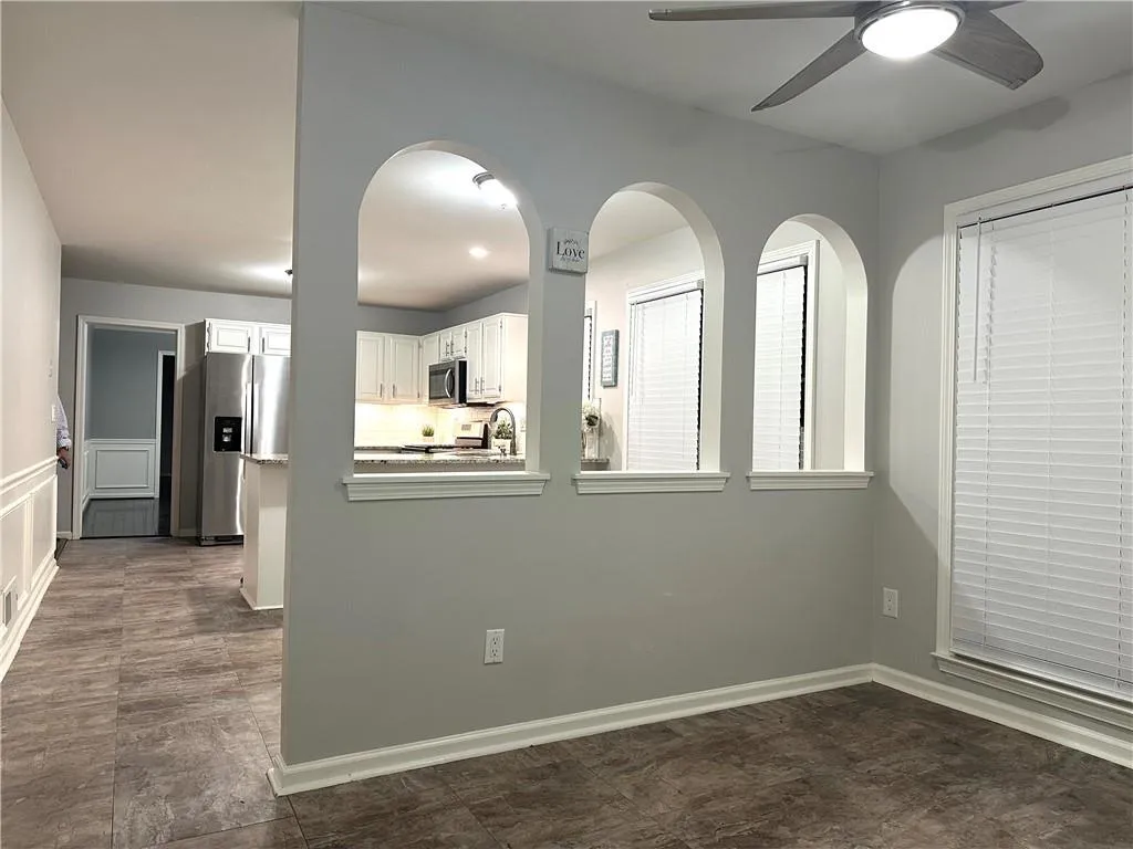 Bright, airy, eat-in kitchen with sunroom (taken at night)