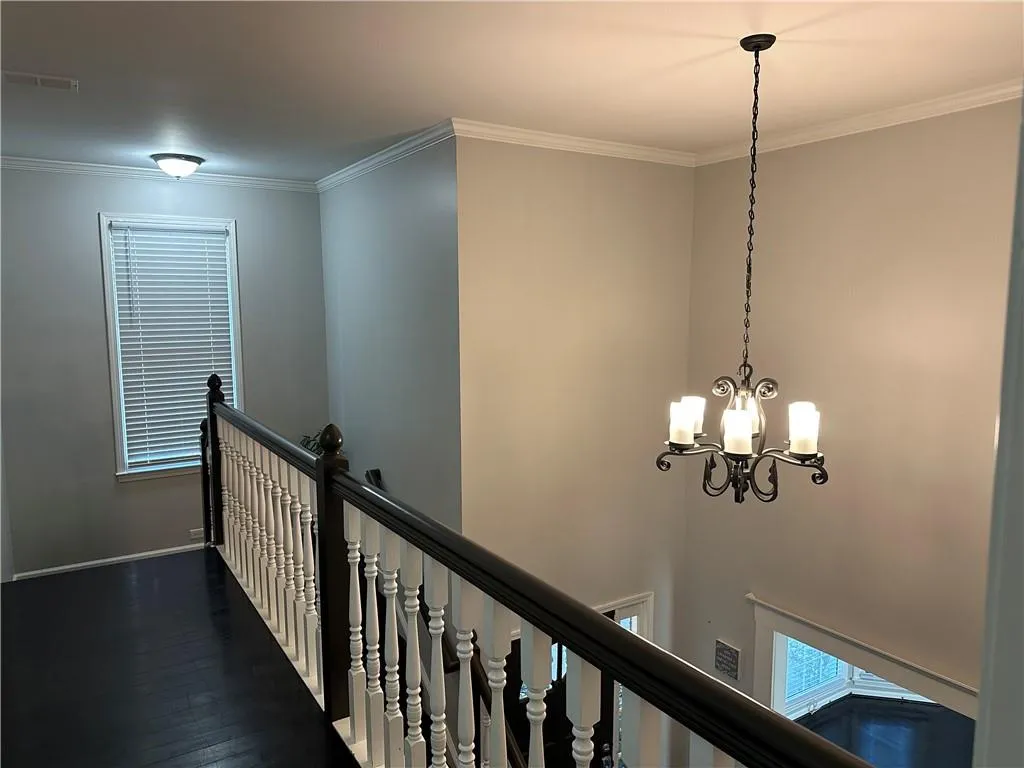 Walkway leading to bedrooms