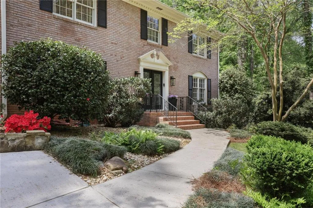 Walking up to the front door you are greeted by beautiful landscape