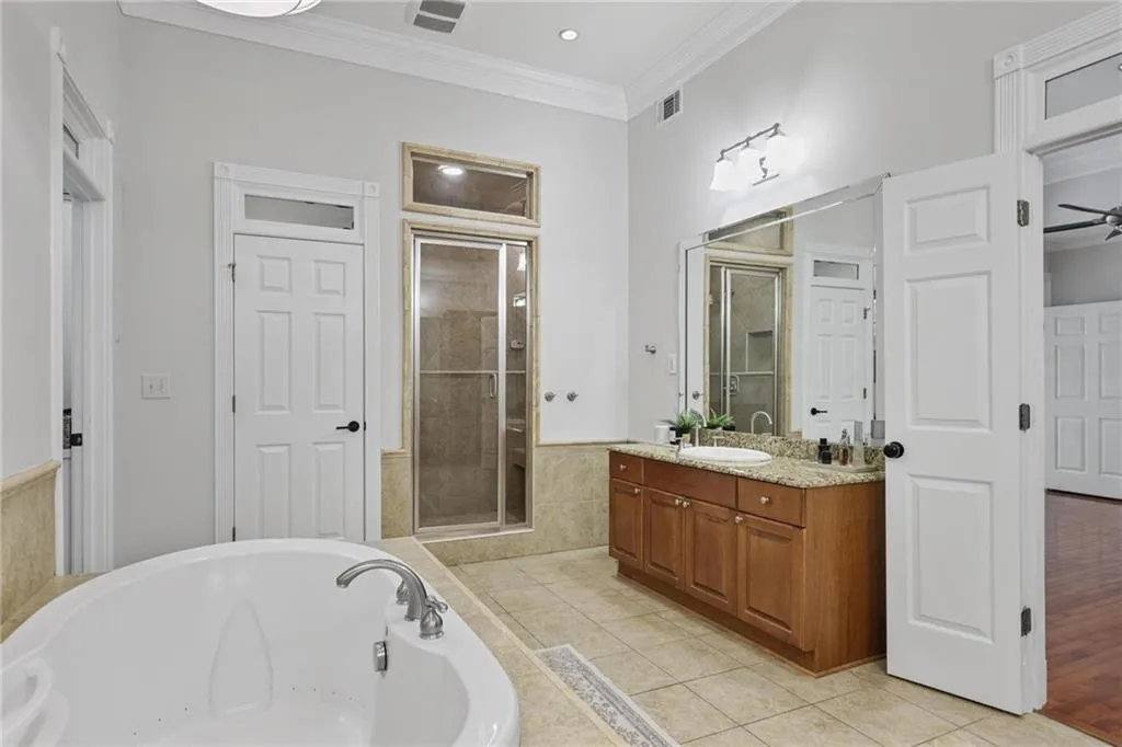 Primary bath features a steam shower