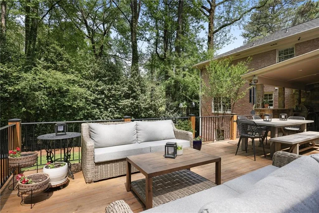 Wooden terrace featuring outdoor lounge area