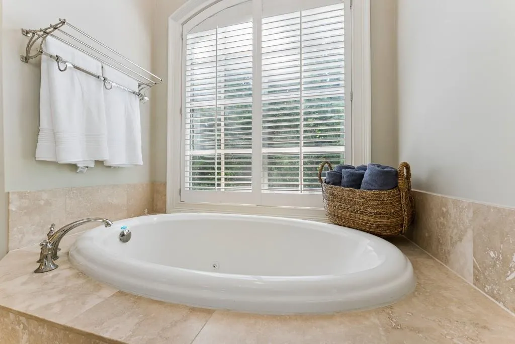 Primary Ensuite With Dual Vanities Whirlpool Tub And Separate Shower Design