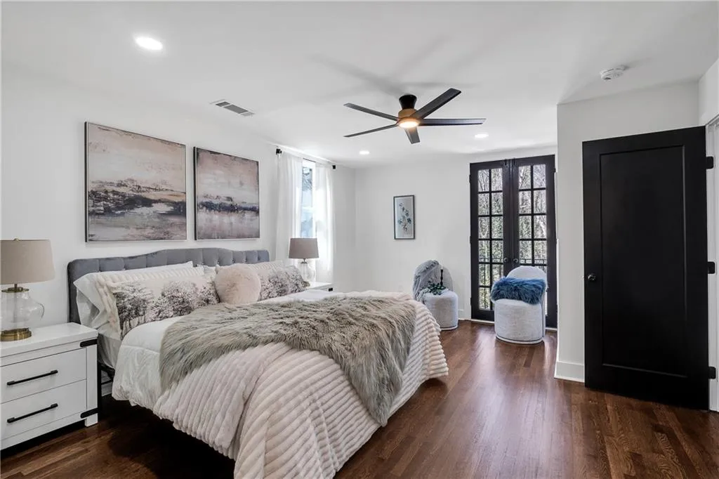 Bedroom featuring visible vents, dark wood-type flooring, recessed lighting, french doors, and ceiling fan