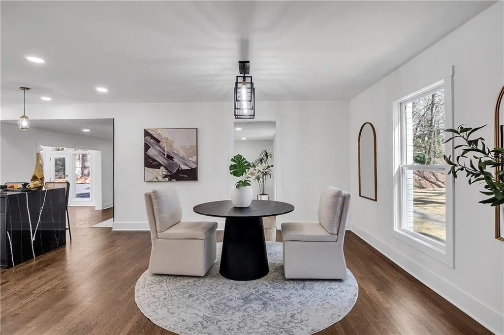 Dining space featuring recessed lighting, baseboards, and dark wood finished floors