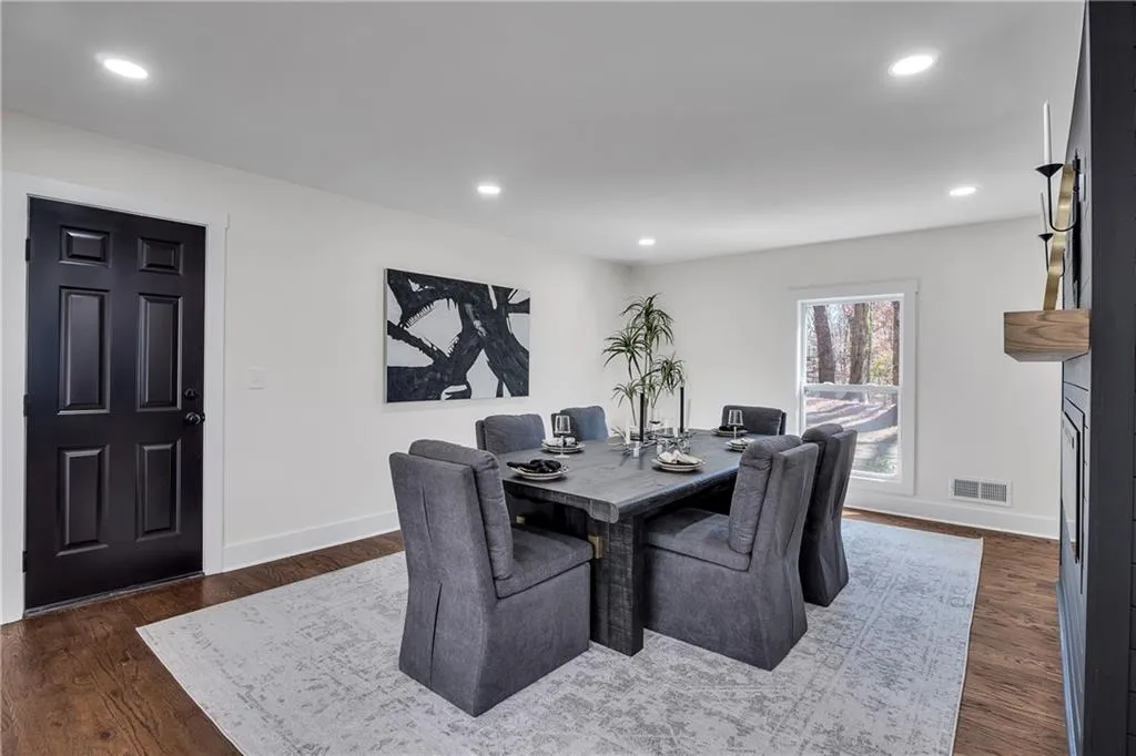 Dining room featuring visible vents, recessed lighting, baseboards, and wood finished floors