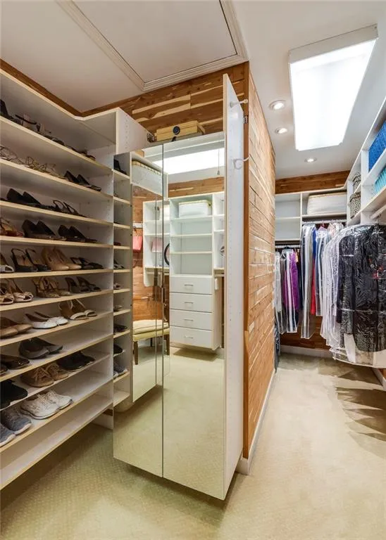 Custom-designed cedar closets with extensive storage system.