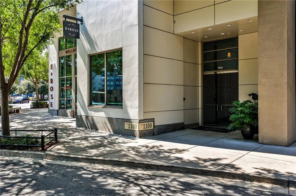 Street-level entrance to 1100 Howell Mill, with E+ROSE café on-site