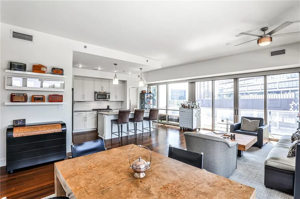 Open-concept kitchen, dining, and living areas perfect for hosting
