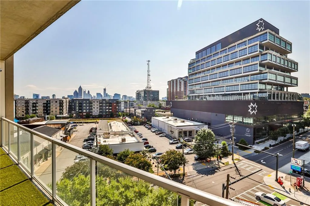 Enjoy sweeping views of Midtown and The Interlock from your private covered balcony in the heart of West Midtown