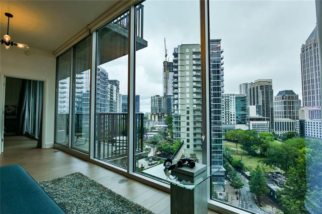 Balcony featuring a skyline view