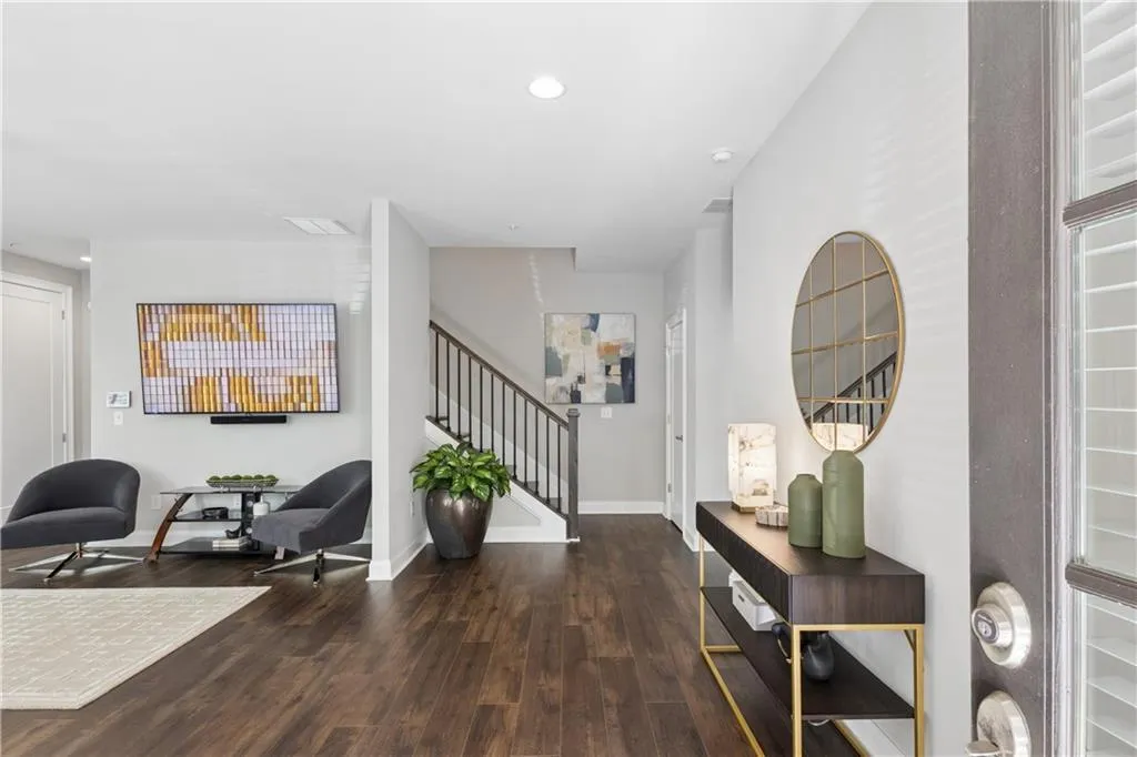 Living space on main level in addition to a bedroom with ensuite and additional storage or elevator shaft.  This home is elevator ready!