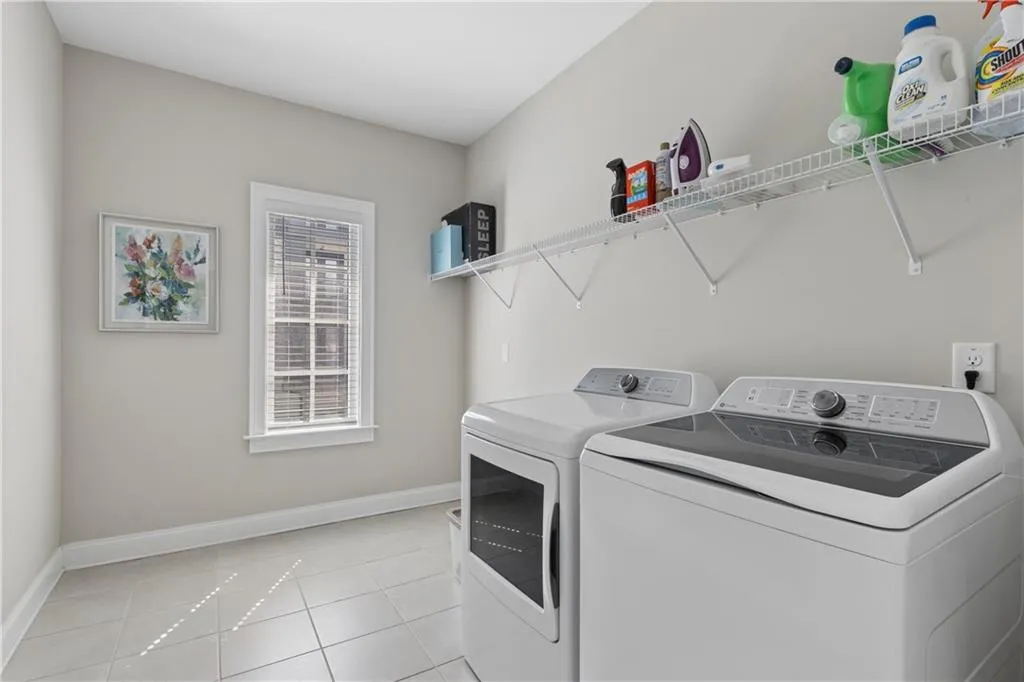 Laundry room on the same level as the primary suite