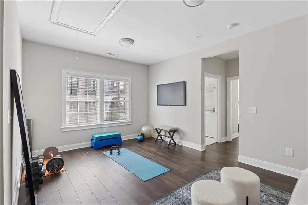Loft area or den makes for a perfect wellness area or additional rec space