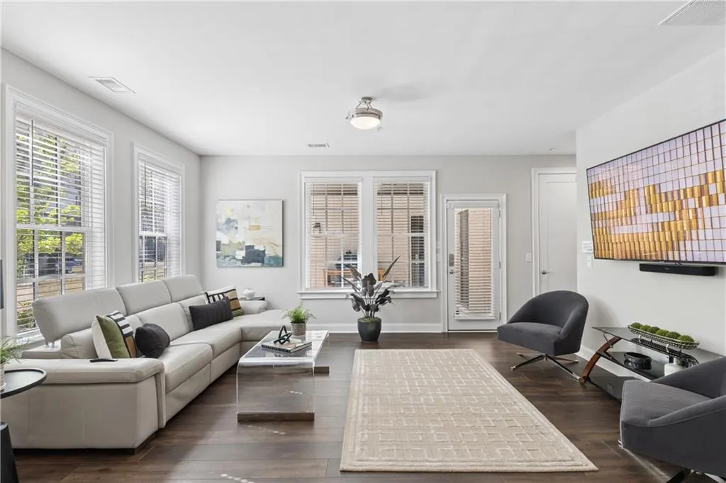 Living room on main level with bedroom and ensuite makes for  ideal guest quarters.