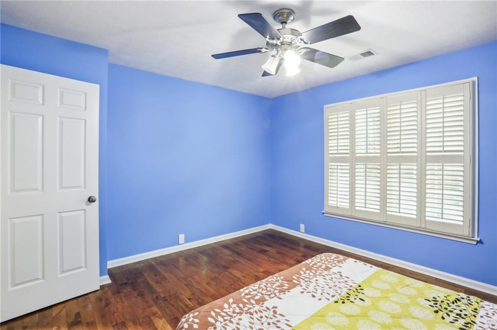 Upstairs front guest bedroom in front.