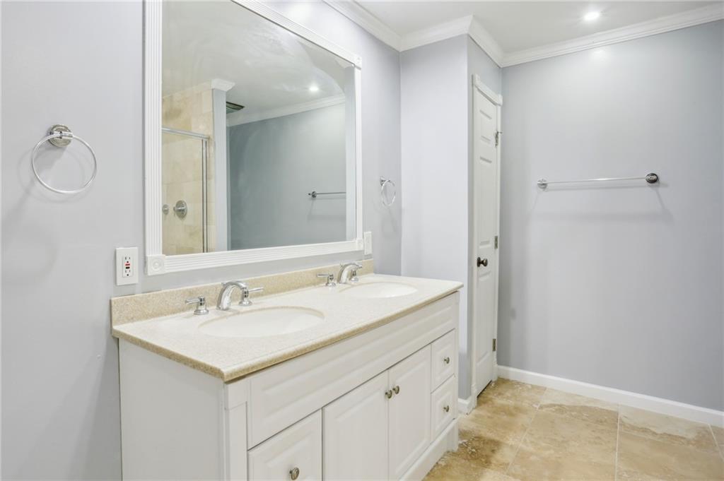 Primary bath with double vanity.