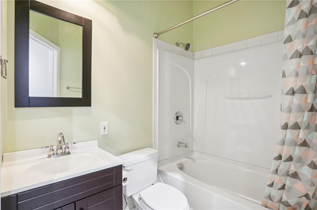 Renovated full bathroom in basement/lower level.