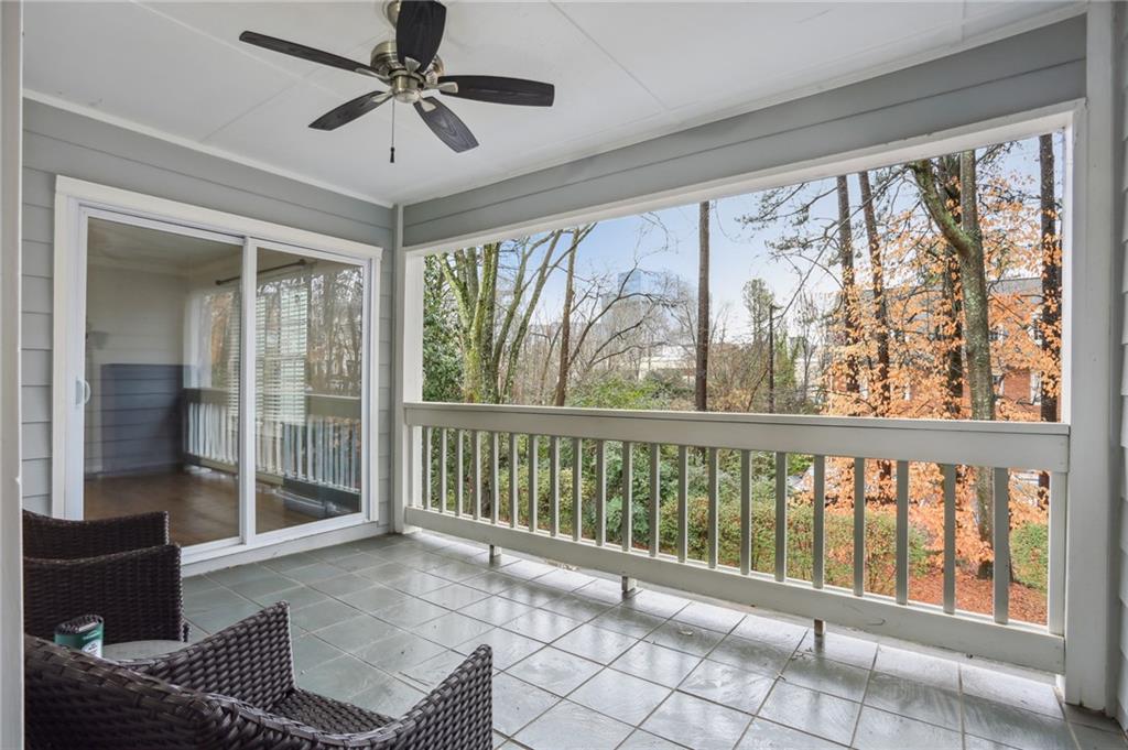 Covered and tiled rear porch.