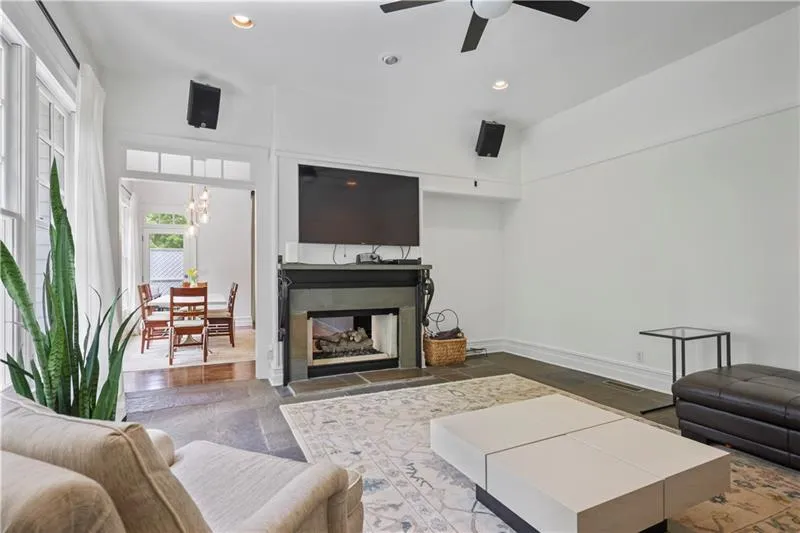 Bonus room off of the kitchen with fireplace