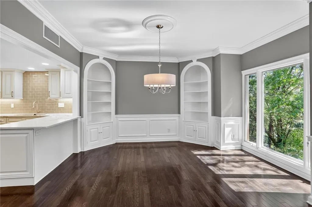 Formal Dining Room with Built-ins, Opens Up to the Kitchen and Tons of Natural Light. Formal Dining Room with Built-ins, Opens Up to the Kitchen and Tons of Natural Light.