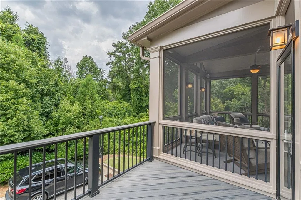 Wooden terrace featuring ceiling fan
