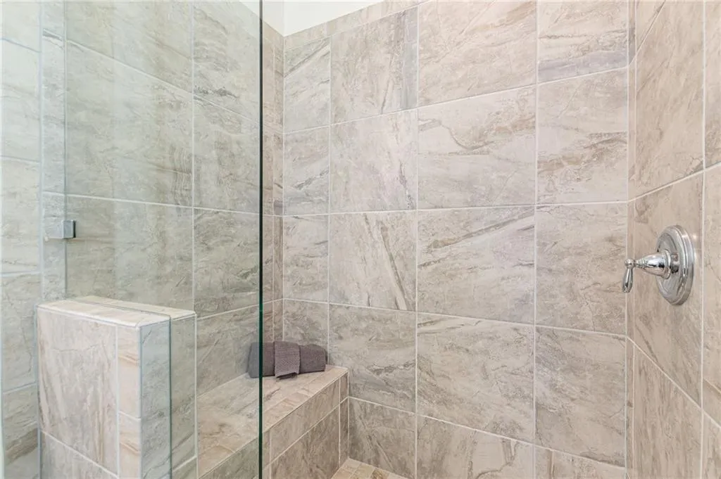 Bathroom with tiled shower