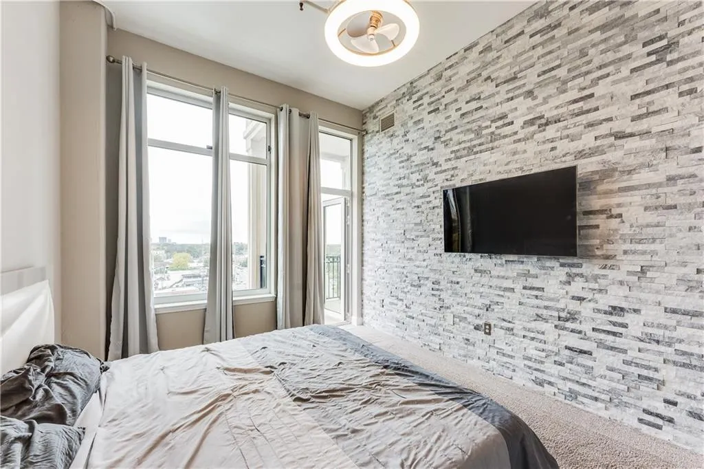 Bedroom with multiple windows
