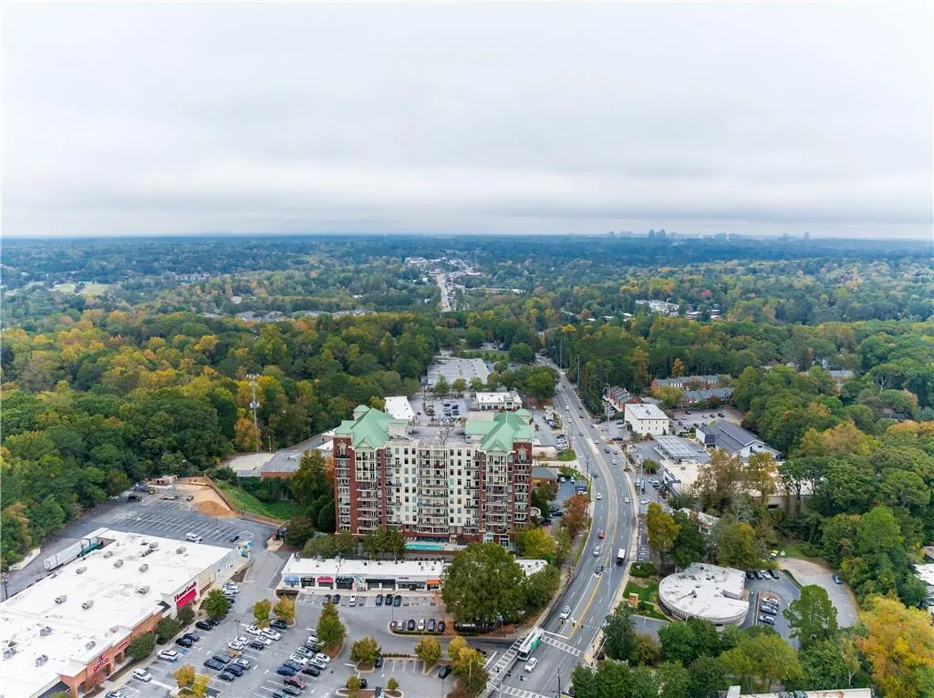 Drone / aerial view with a wooded view