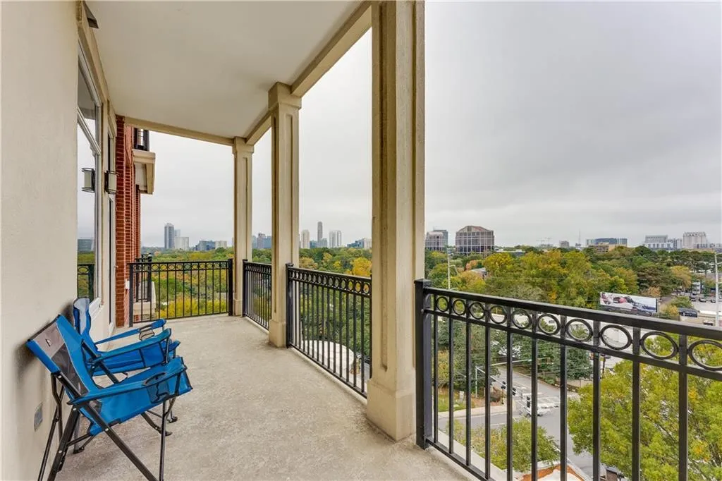 Balcony featuring a view of city