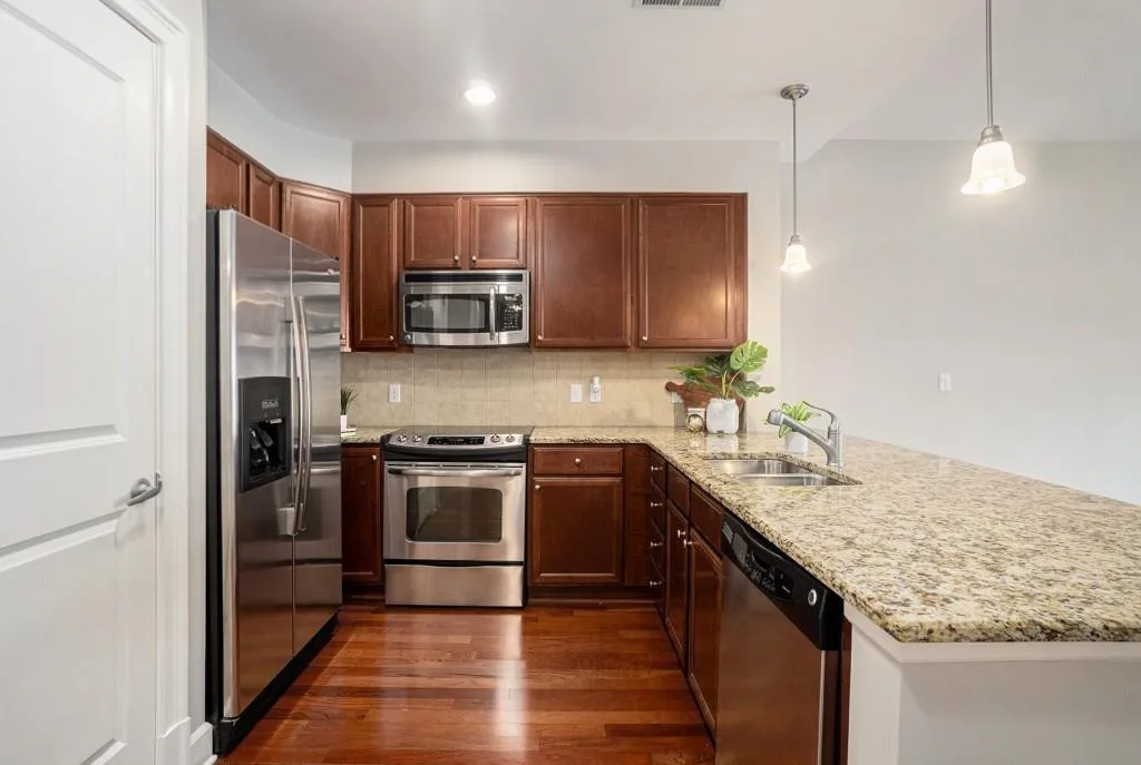 Step inside to an Open Concept Living Area filled with Natural Light, where Elegant Finishes and Modern Design create an inviting atmosphere.