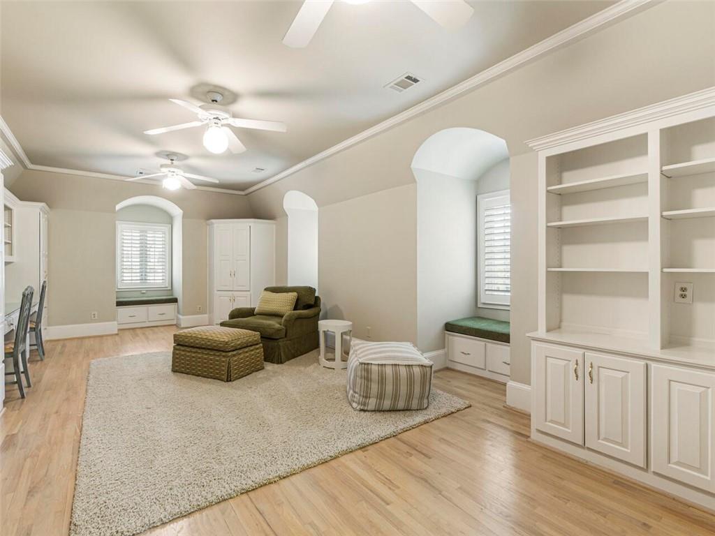 Sunny bonus room with custom built ins could be 7th bedroom