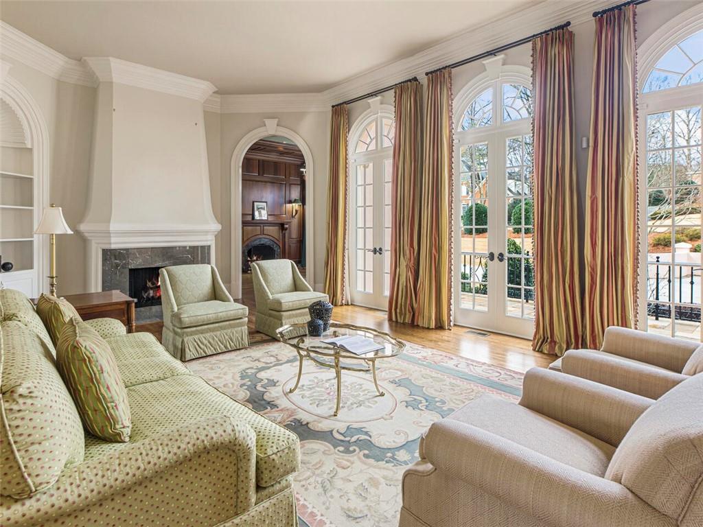 Spacious living room with beautiful built ins and fireplace
