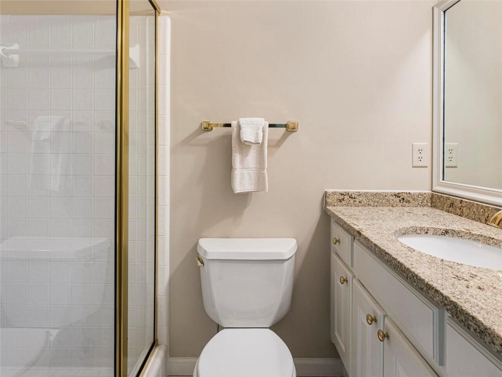 Full bath with tile shower