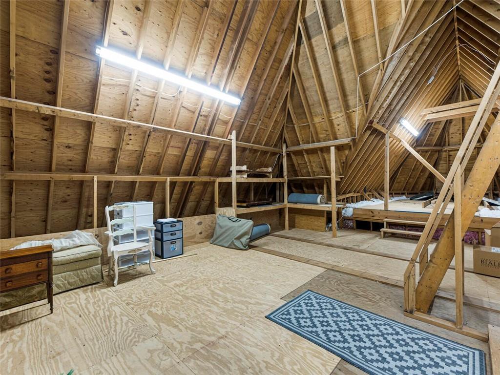 Plenty of storage in attic right off the second level