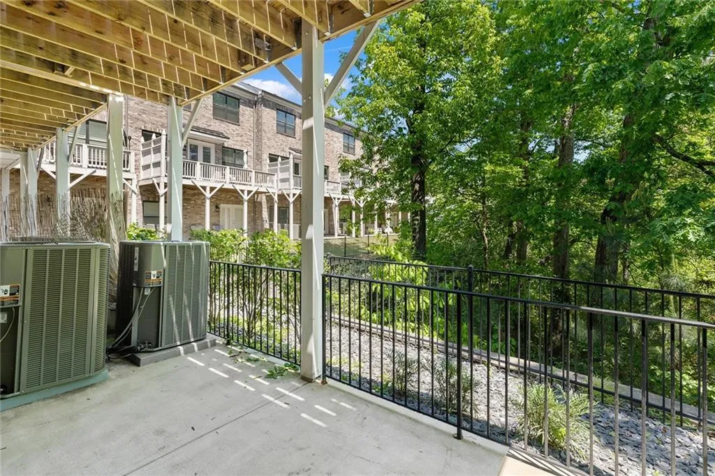 Terrace-level patio looking into the woods