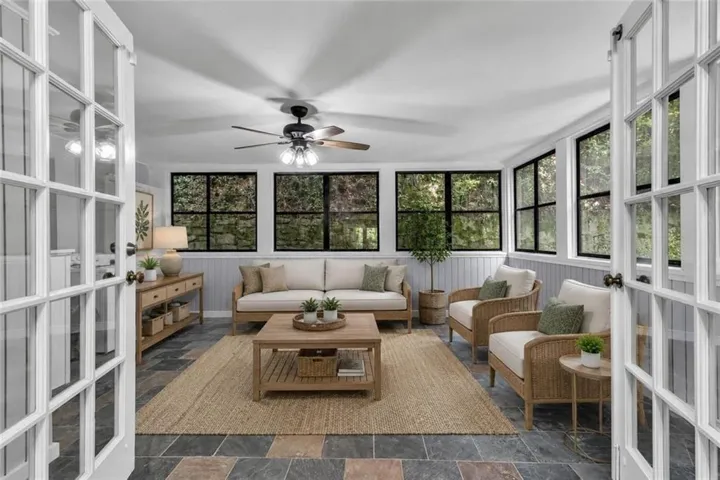 Sunroom (virtually staged with furniture and decor)