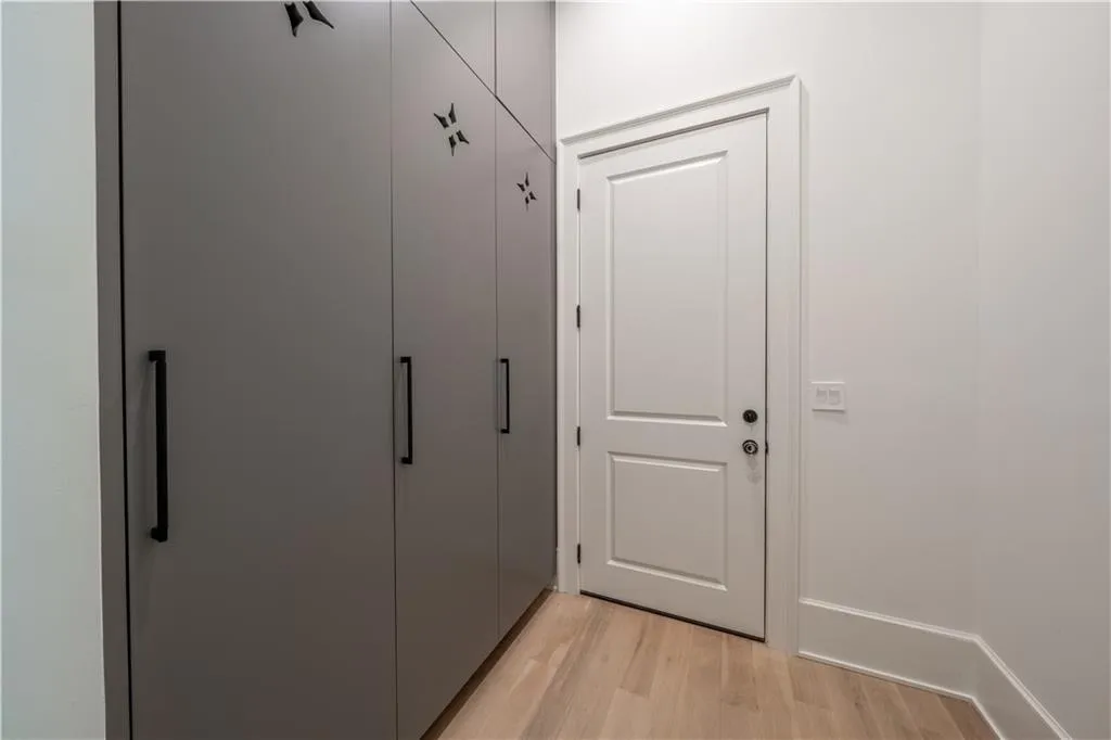 Doorway to outside featuring light hardwood / wood-style floors