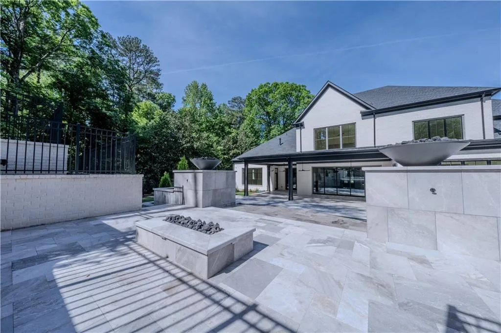 View of patio / terrace with a fire pit
