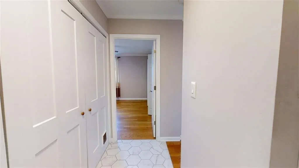 Hallway featuring light wood-type flooring