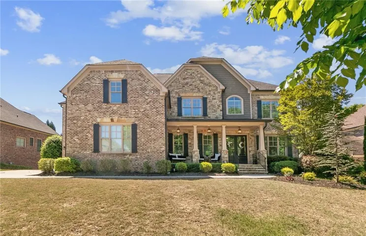 3 car garage with custom built-in storage in both garages