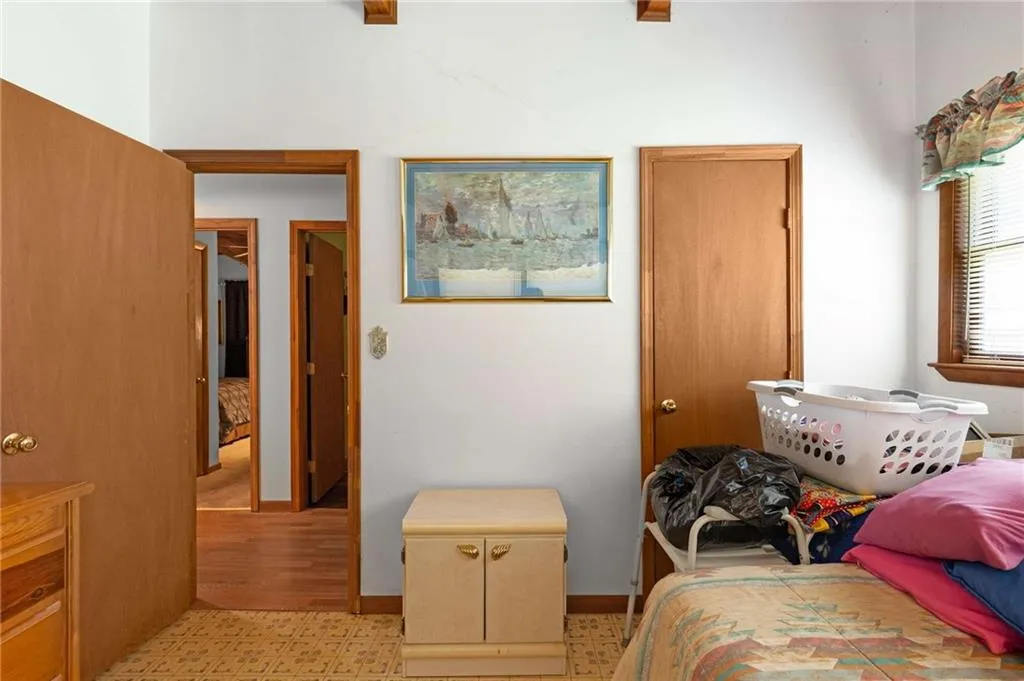 Bedroom featuring baseboards