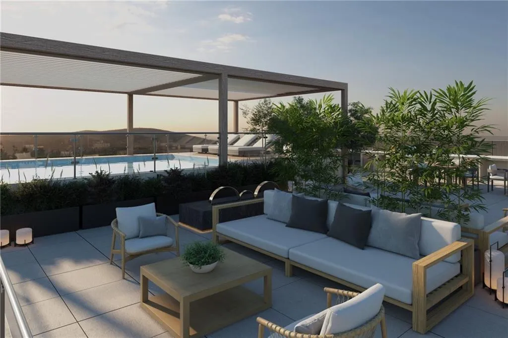 Rooftop Terrace with Heated Plunge Pool, Wine Bar, Summer Kitchen, and Fitness Studio