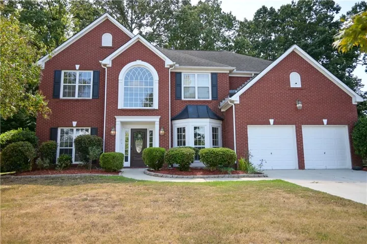 Brick exterior with white trim
