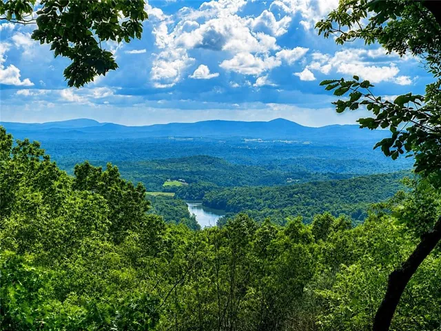 Enjoy breathtaking long-range mountain views that stretch for miles, offering a peaceful backdrop in every season. Bent Tree's own Lake Tamarack can be seen here too.