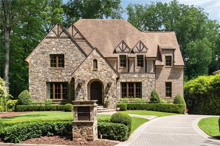 Stone and brick exterior with timber-frame gables